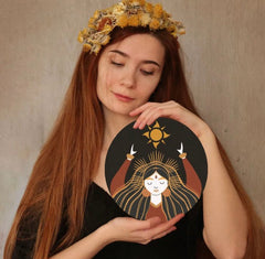 Myself and my logo that my art is known for, which is a portrait of the norse goddess sol.