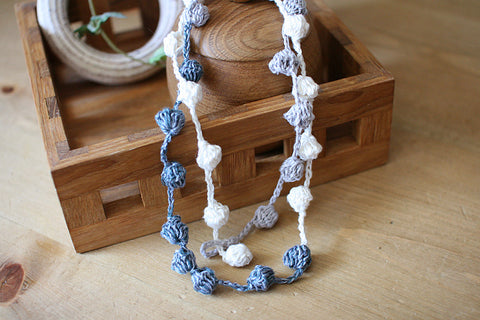 Crochet pattern Spherical necklace wearing image