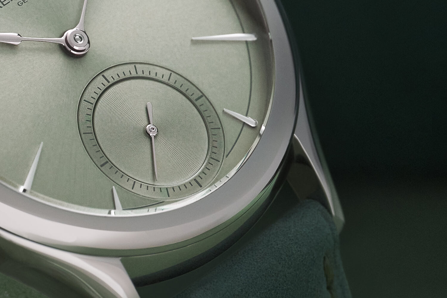 Close crop on the highly polished "Laurent Ferrier Classic Micro-Rotor Magnetic Green" dial featuring white gold indexes and 'assegai' hands.