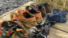 muddy pair of outdoor shoes
