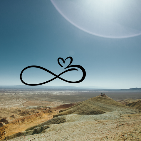 Brown mountainous desert, blue sky, large white sun, and black infinity heart symbol.