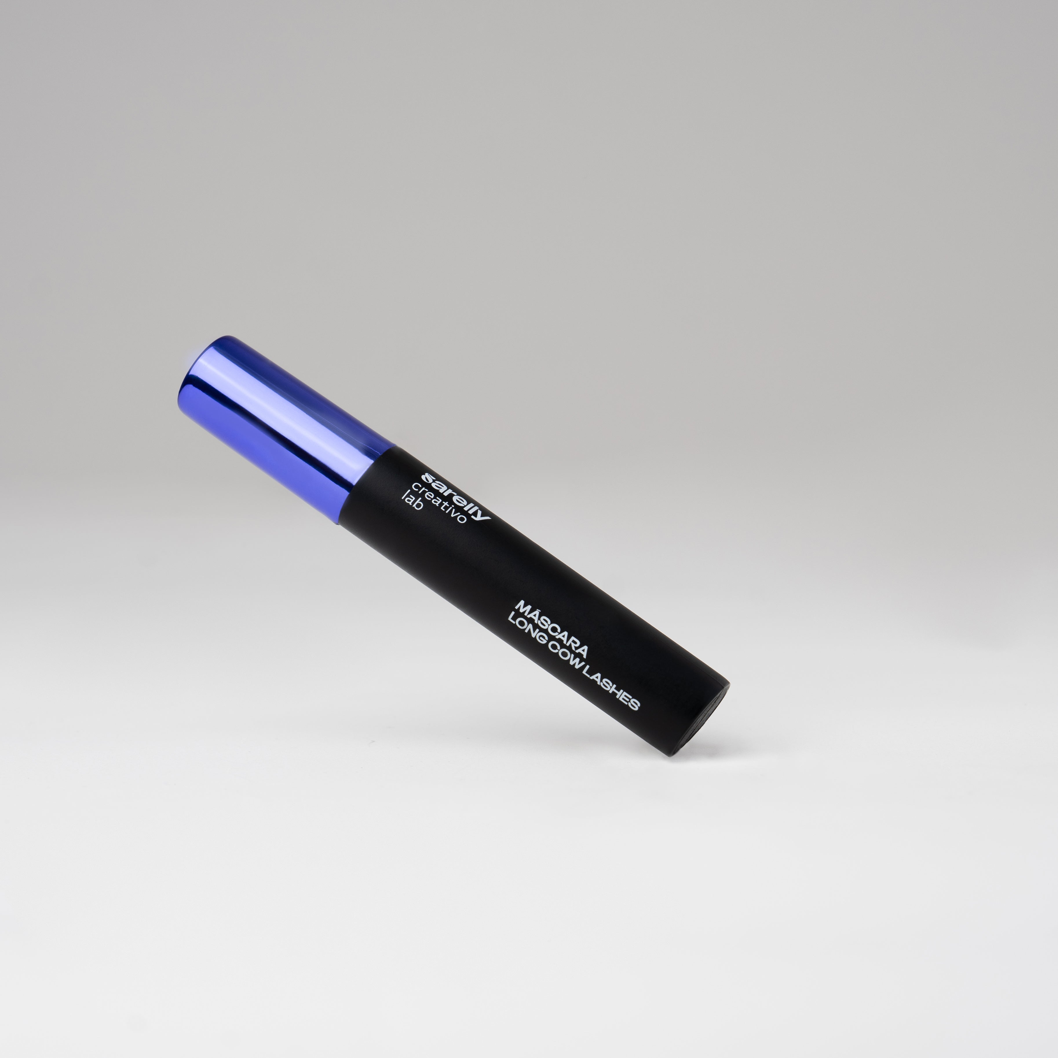 Black and blue mascara tube labeled 'Long Cool Lashes' on a simple background.