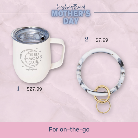 White mug with "Tired Moms Club" printed on it and a bangle with keychain attachment.