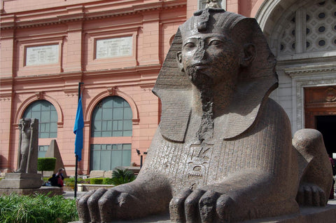 Picture of archaeological statue outside of the Egyptian Museum in Cairo