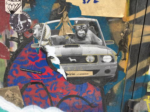 Street art in Barcelona, Spain featuring monkey collage