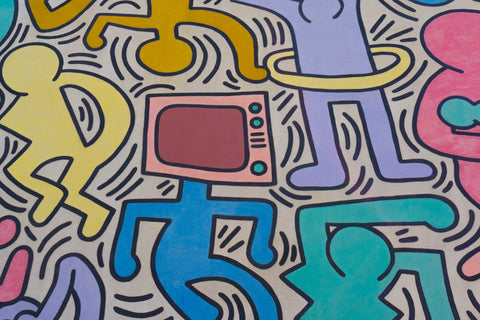 Keith Haring blue, yellow and purple doodle illustration