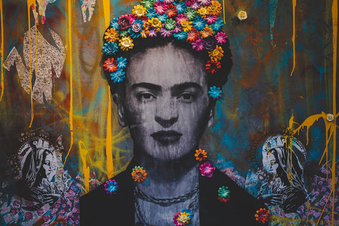 Graffiti painting of Frida Kahlo with famous flower head garland