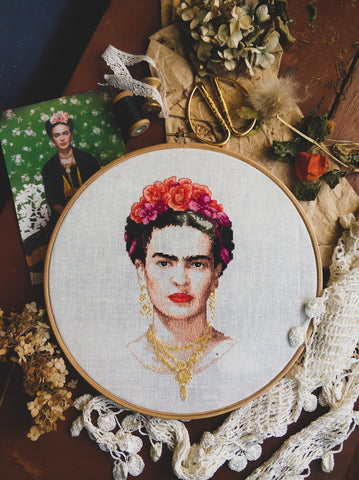 Wooden table with stitched portrait of Frida Kahlo 