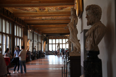 Central view of artwork and sculptures at Uffizi Gallery in Florence, Italy