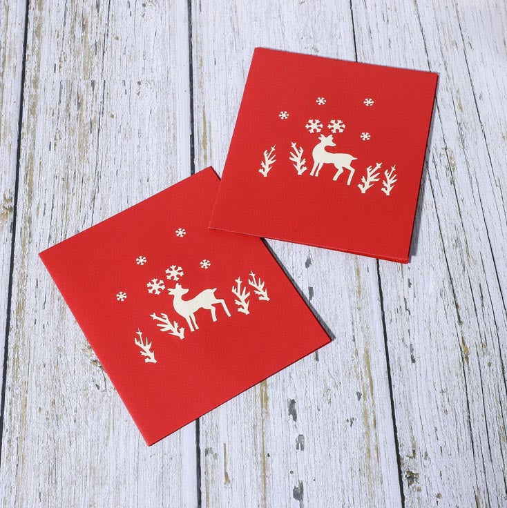 reindeer in the woods pop up card - front cover