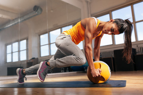 young female working out doing high intensity interval training at the gym in franklin tn