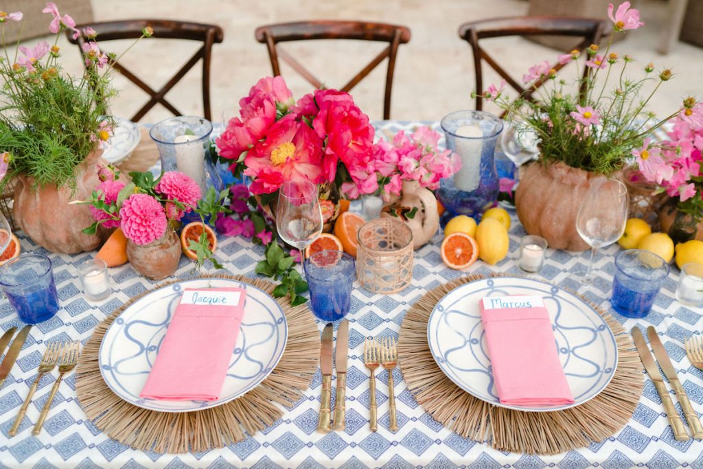 ic: 9-Person Sea Island Wedding, photo by Olivia Rae James, courtesy of Augusta Cole Events. Pale Blue Serenity plates from Land of Belle, custom linen by John Robshaw, chargers from Tory Burch Home, and Cotton Candy Napkins by Sffera.