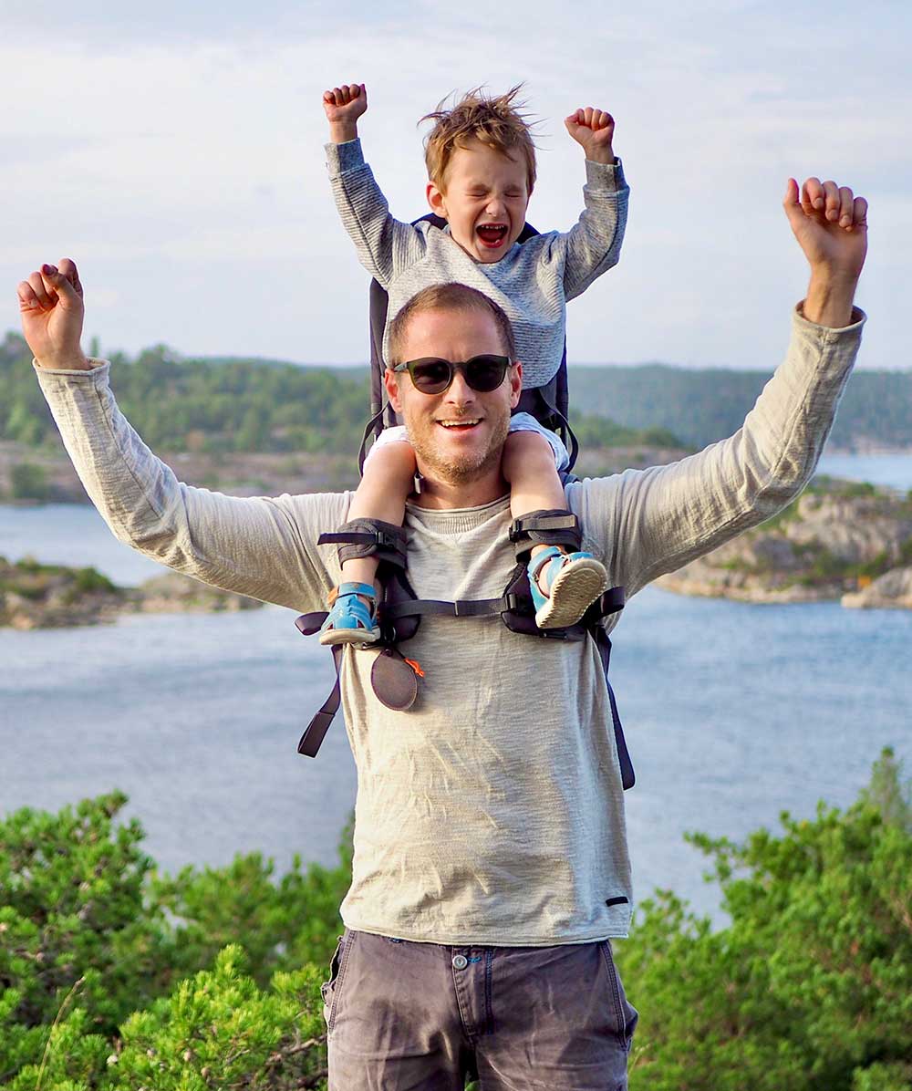 carrying toddler on shoulders