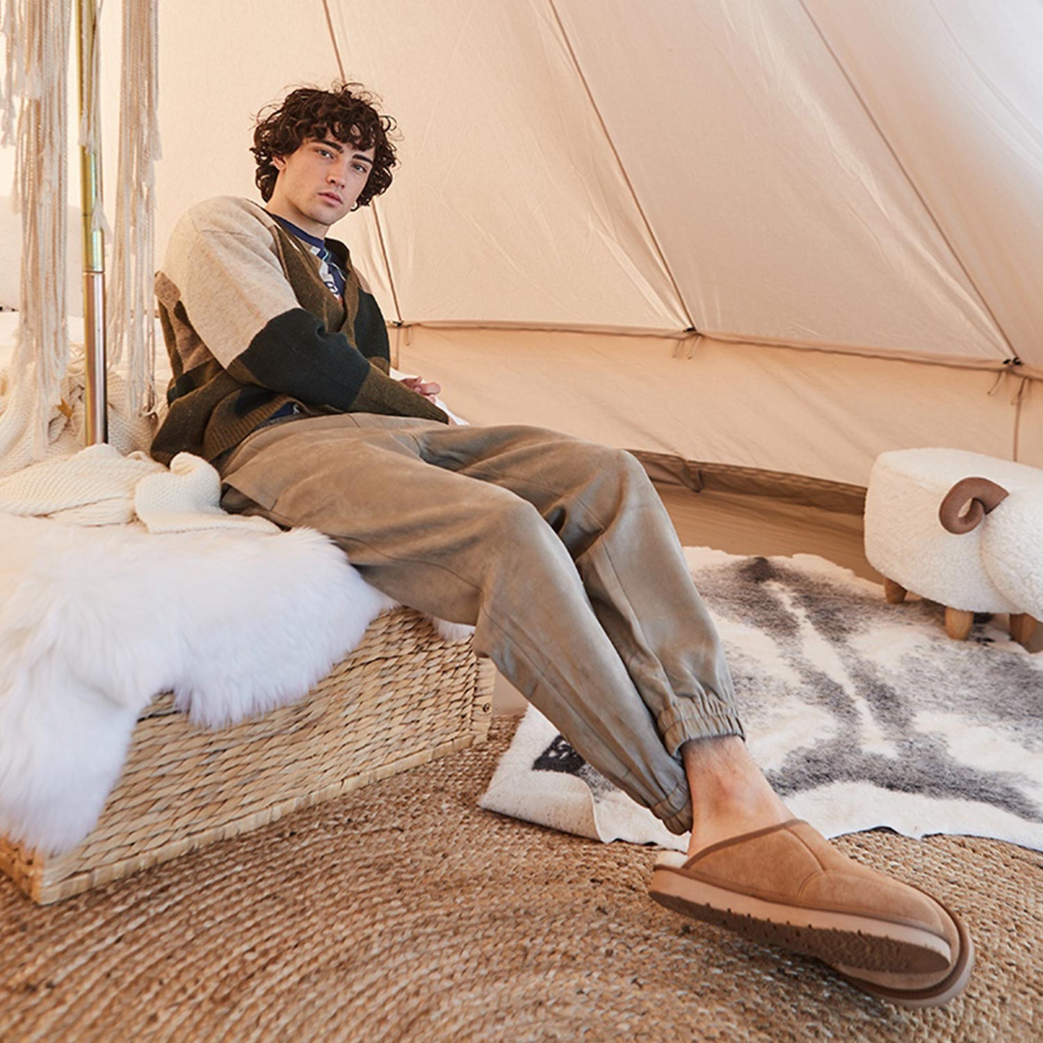 Male Model Wearing UGG Boots in a Tent