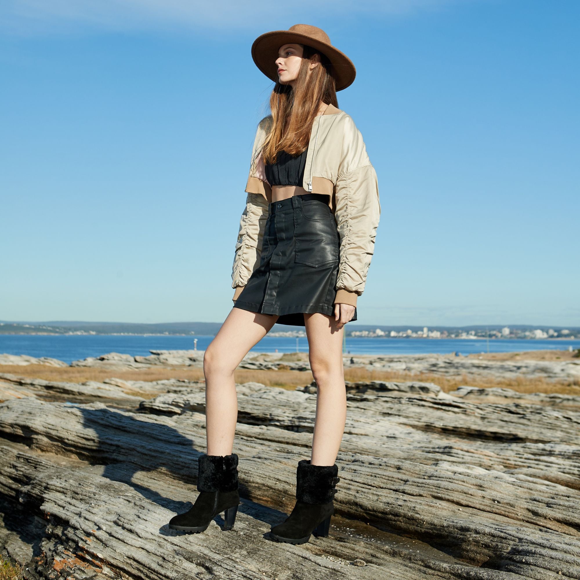 woman styling coastal cow girl with UGG boots