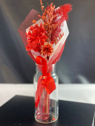 Red bouquet of dried flowers