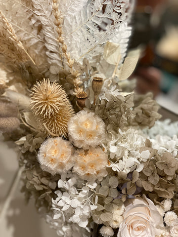 Dried flower arrangement in neutrals