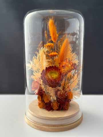 dried flowers in a dome