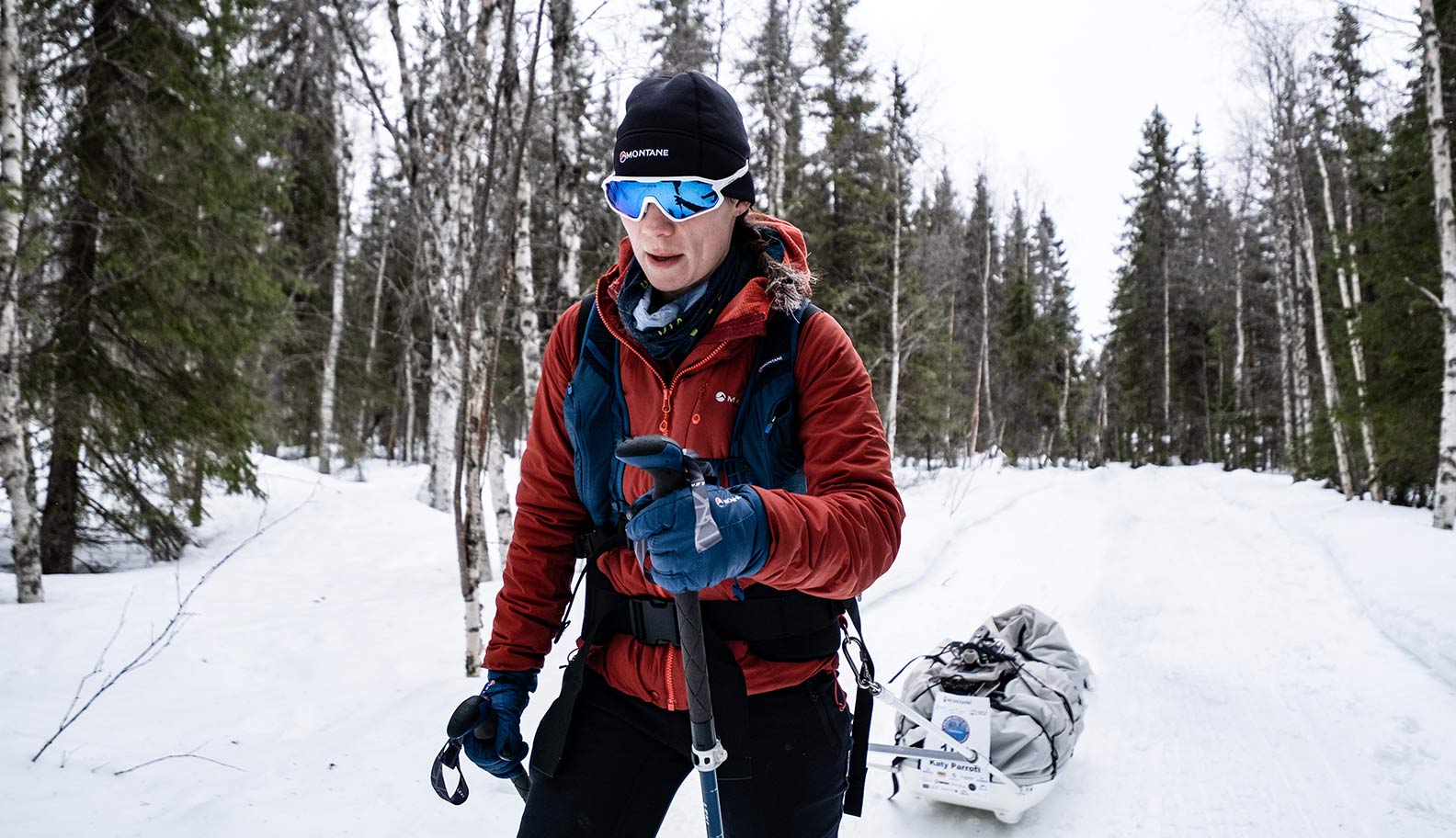 katy-parrot-walking-with-sled-in-snow