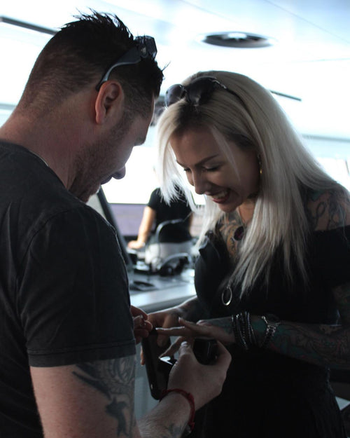 Musician Jayce Lewis proposes to tatttoo artist Jenna Kerr aboard Squid Ink
