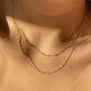 satellite yellow gold necklace