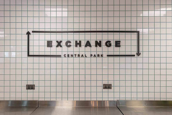 Exchange wall sign