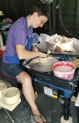 Autumn throwing on the potters wheel