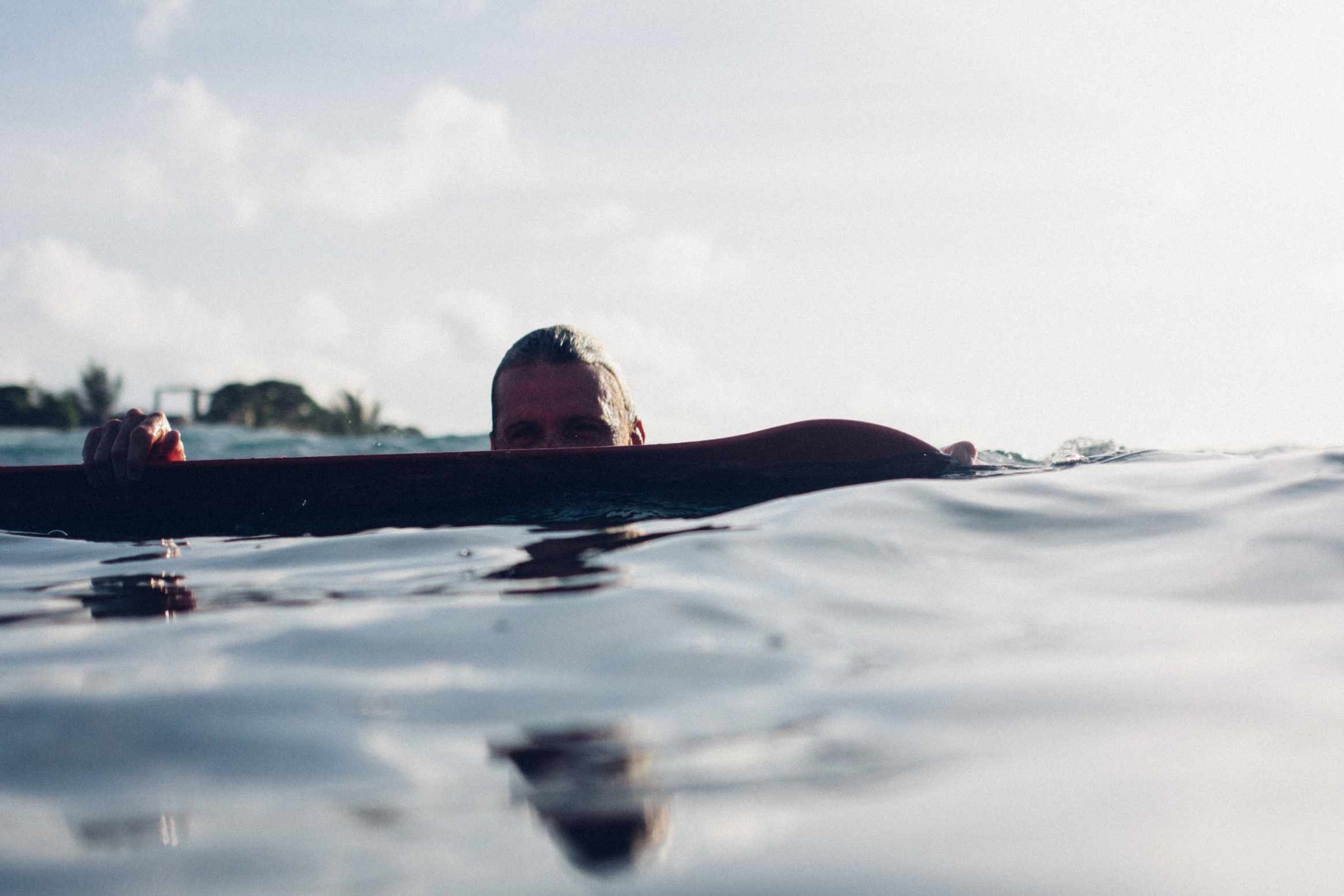 wooden board surf trip bellyboard