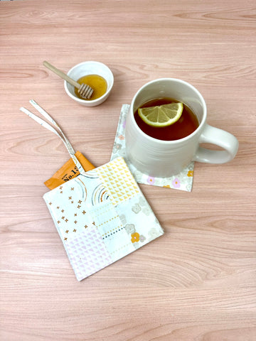 handmade coaster and mug with herbal tea