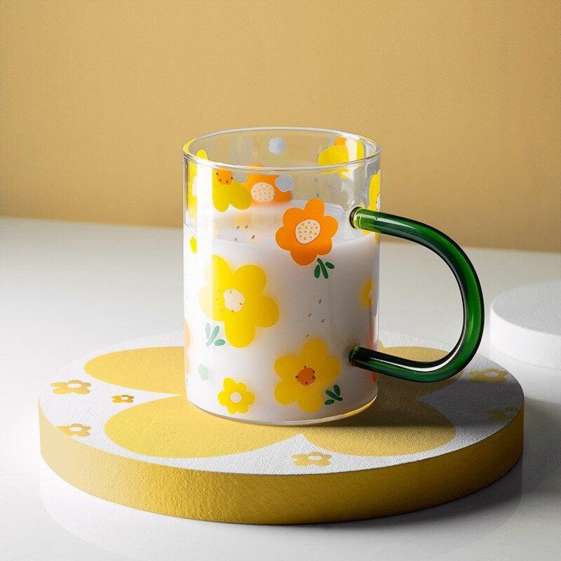 https://cdn.shopify.com/s/files/1/0519/8643/2149/products/nordic-glass-cup-with-big-handle-ohoj-design-1_1024x1024.jpg?v=1642478864
