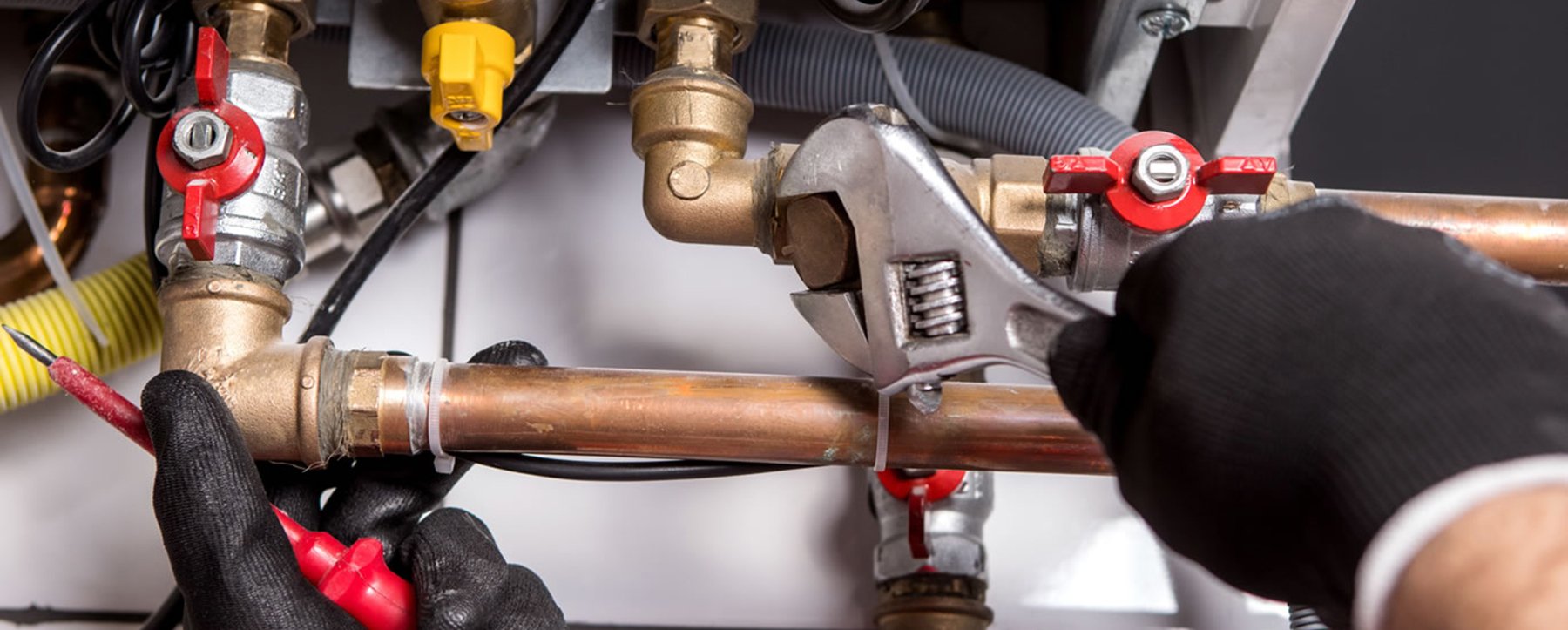 Repairing and servicing gas fires with certified gas fitters