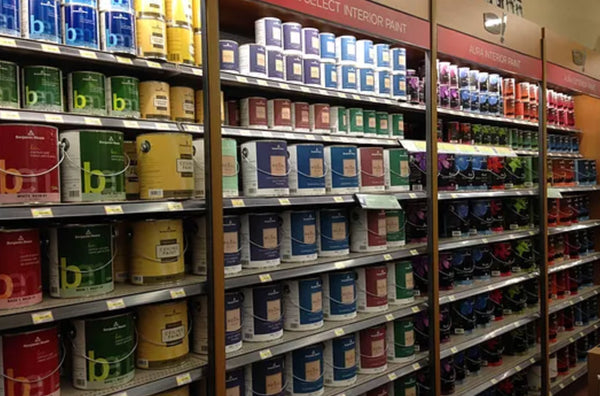 shelves filled with paint cans