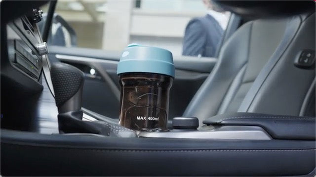 Portable electric cold brew coffee cup fits into car cup holder