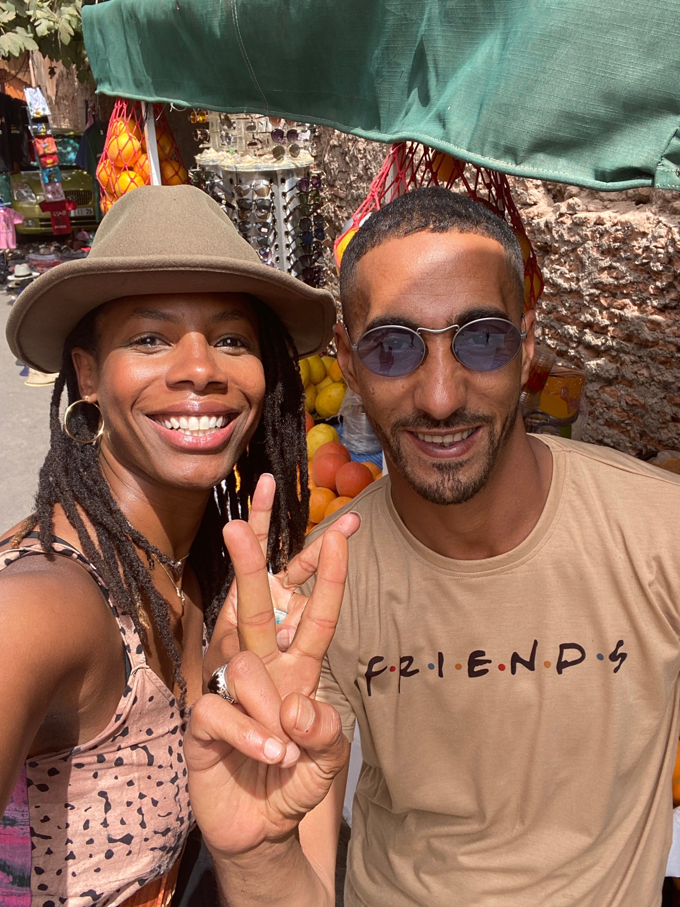 Moroccan locals and tourists befriending one another in the Kasbah near the Medina