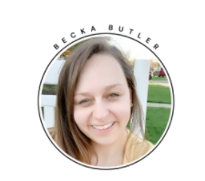 a round, close-up of the blog author, Becka Butler with a grassy background