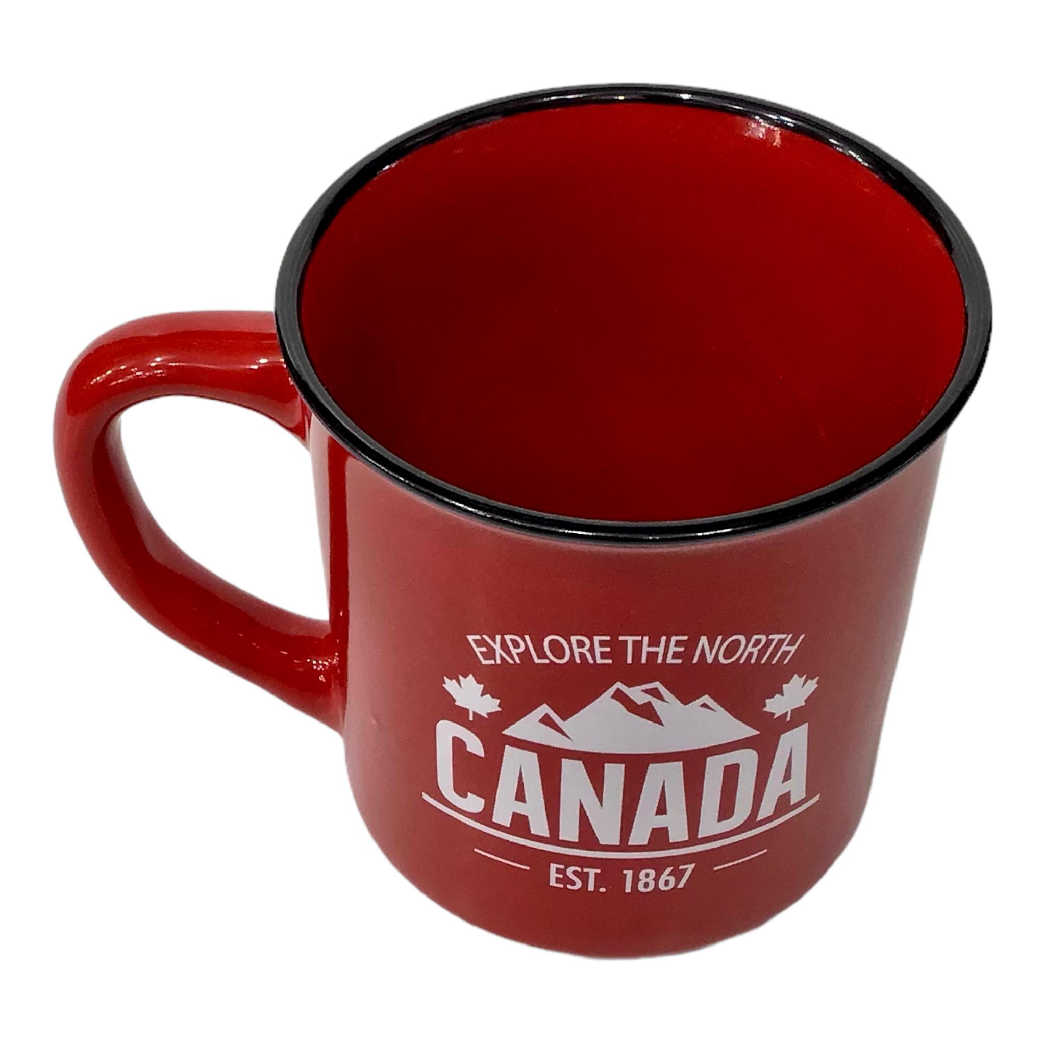 CANADA COFFEE MUG - EXPLORE THE NORTH WHITE PRINT W/ RED BACKGROUND TE