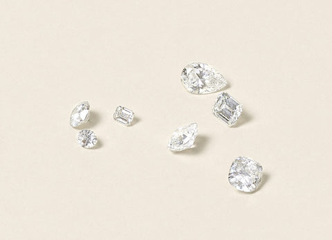Image of an assortment of loose laboratory grown diamonds