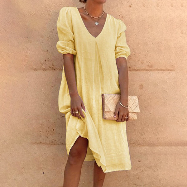 Solid-colored midi dress with V-neck