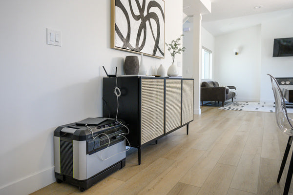 A Yeti PRO 4000 sits in a home and recharges devices