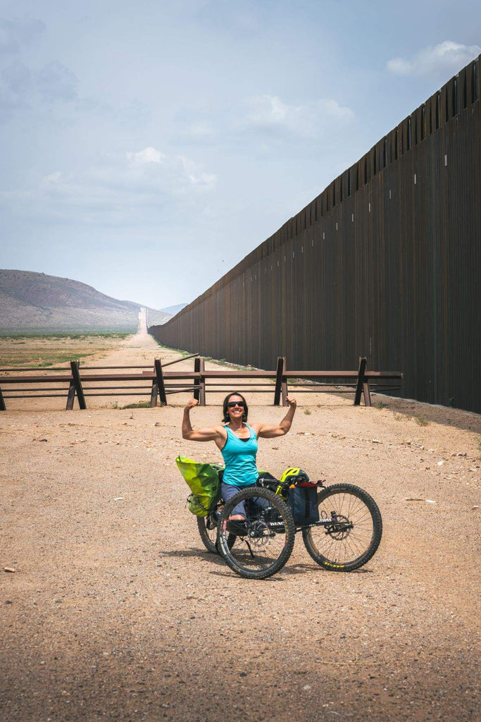 Quinn Brett with her adaptive bike at the border - Tour Divide - Goal Zero