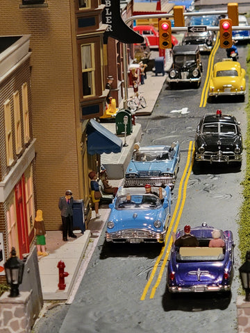 O Scale downtown street with vehicles and figures