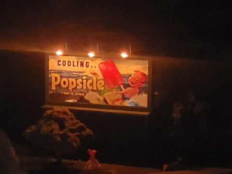 O Scale popsicle billboard at night