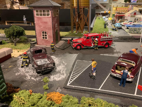 Vehicle on fire scene in O Scale