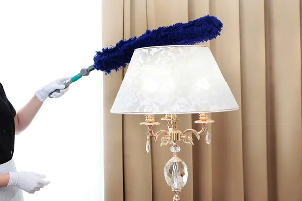 Use a duster to clean dust from the lampshade