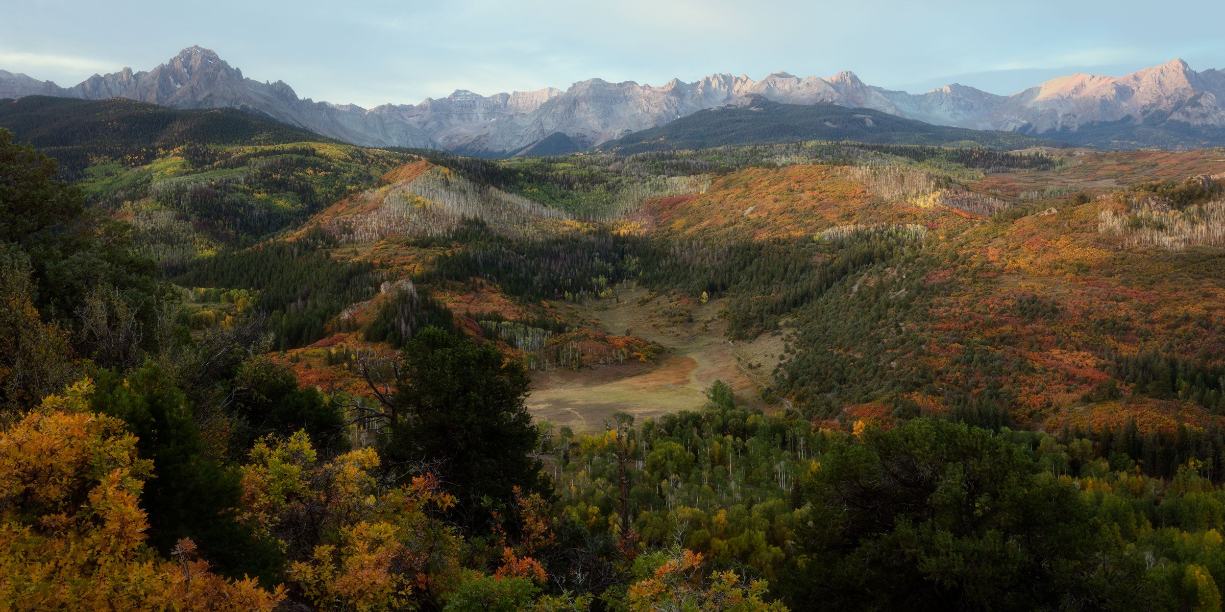 A Lars Gesing fine art nature photograph of the fall colors near Ridgway, Colorado. The best time to see the fall colors in Colorado is usually in late September and early October, and Ridgway, Ouray, Telluride and Silverton are some of the best places to see fall colors in Colorado.