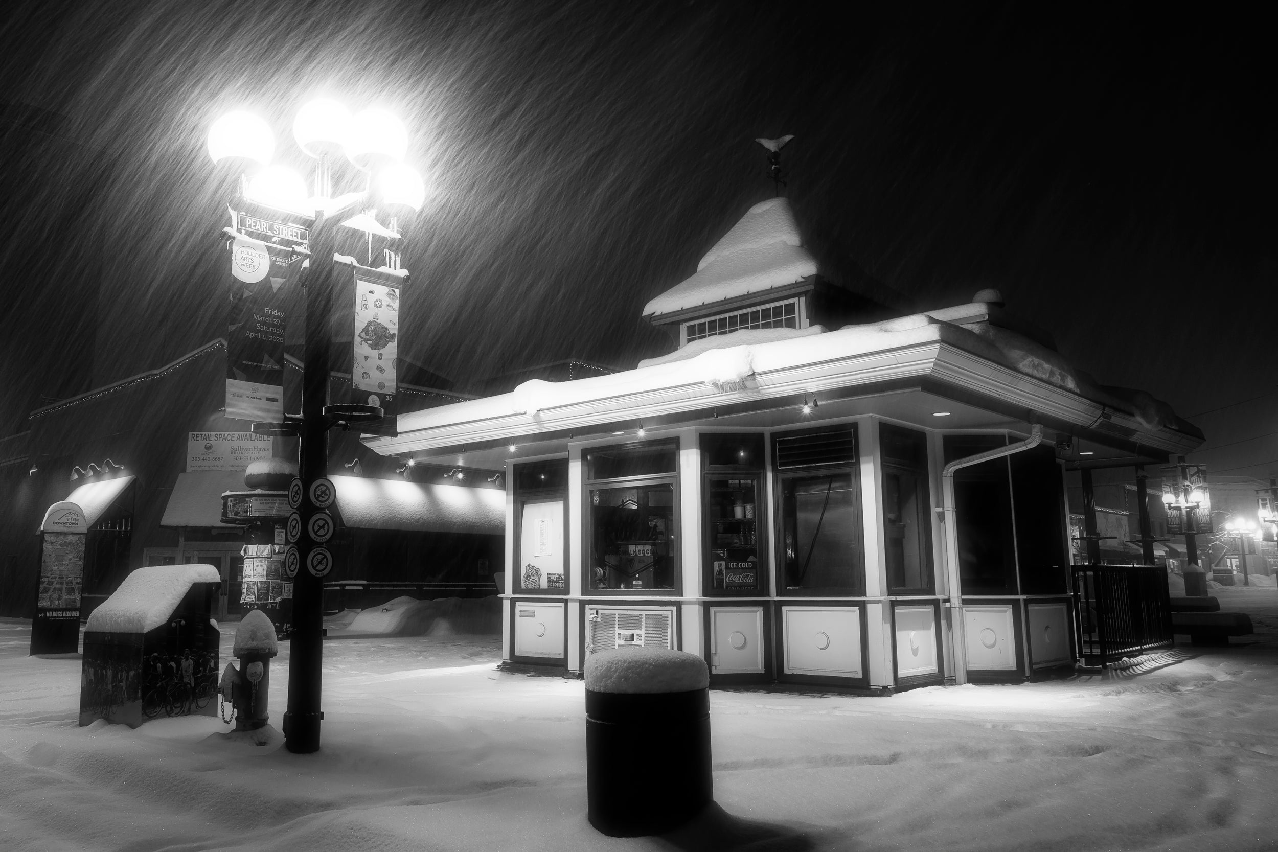 A Lars Gesing Fine Art Nature photograph of Pearl Street in Boulder, Colorado, during a winter snowstorm at night. Pearl Street is a must see stop when visiting Boulder, and is great for shopping and dining in town.