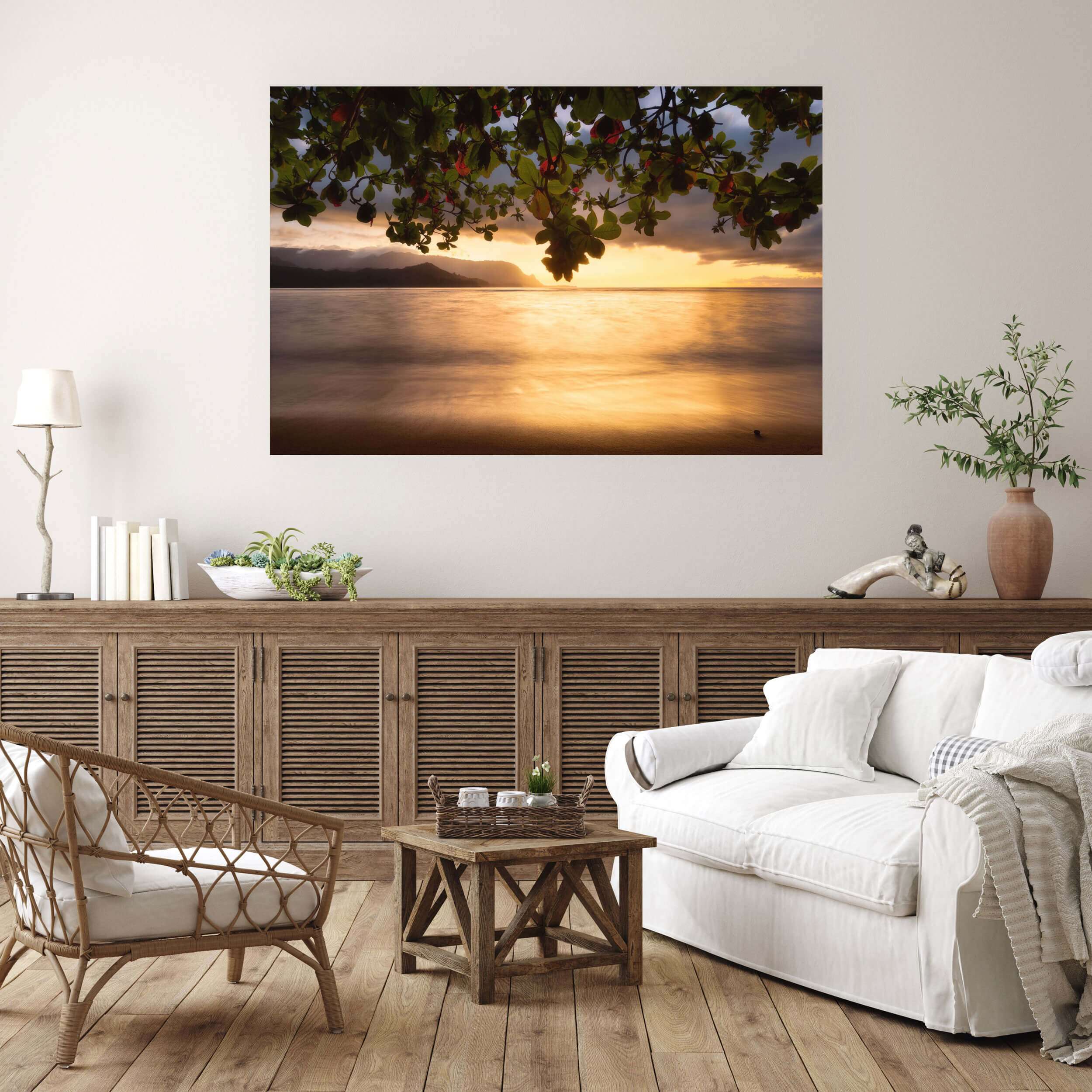 A Puu Poa Beach picture from Hanalei Bay in Kauai hangs in a living room.