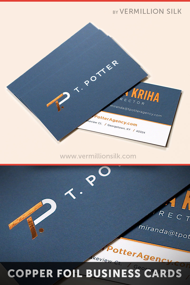 Copper foil stamped silk business cards with blue ink