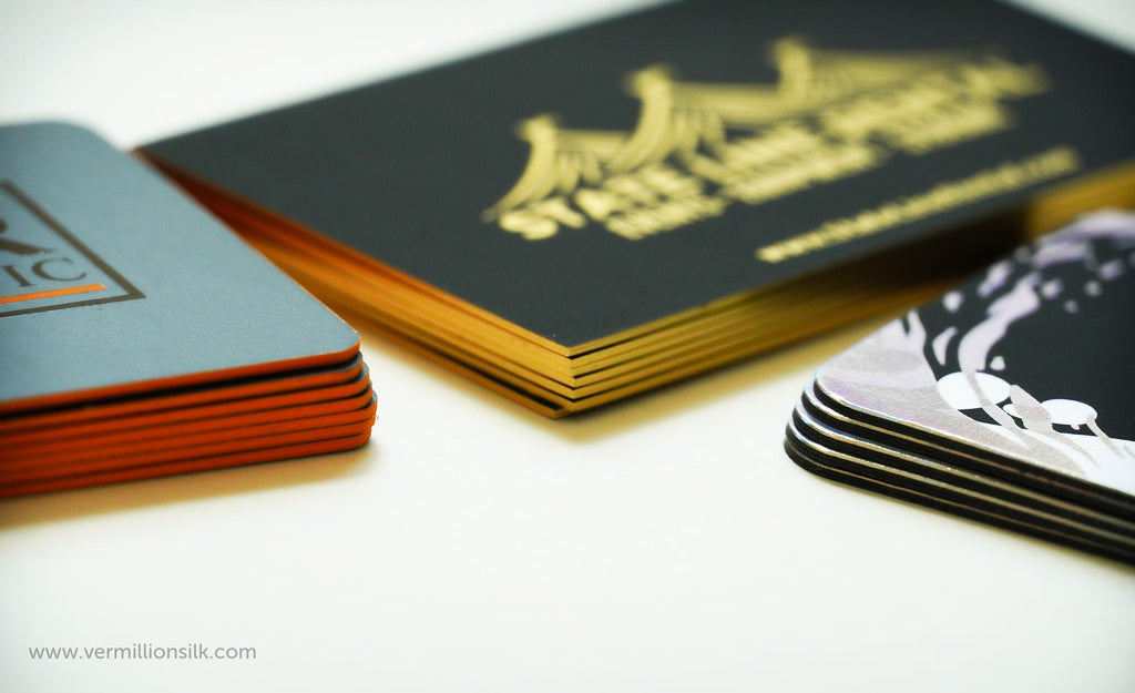 painted edge and foiled edge business cards on thick paper