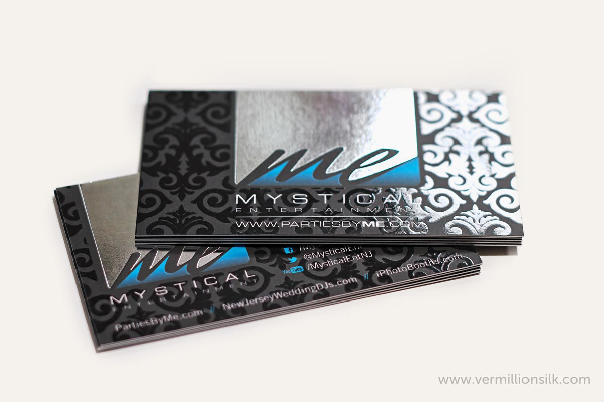 black silk business cards with silver foil and blind spot uv